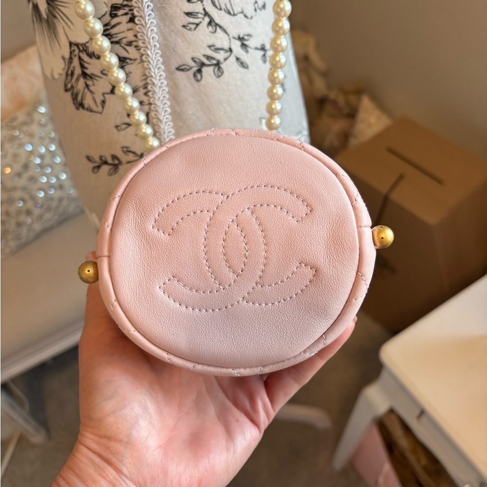CHANEL Light Pink Quilted Mini Drawstring Bag with Pearl Chain. Never Used. - Picture 8 of 16